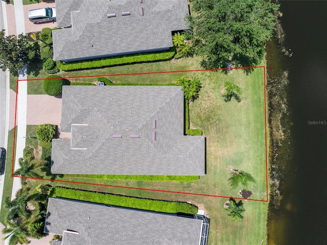 bird's eye view with a water view