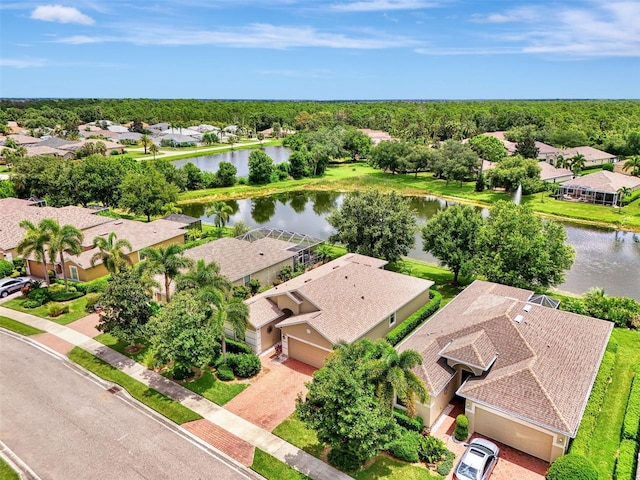 drone / aerial view with a water view