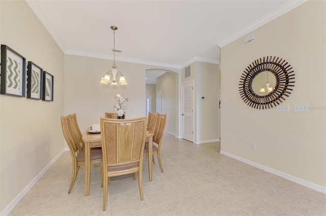 dining room featuring a notable chandelier, light tile patterned floors, and ornamental molding