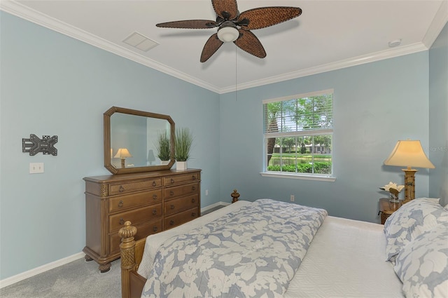 bedroom with light carpet, ornamental molding, and ceiling fan