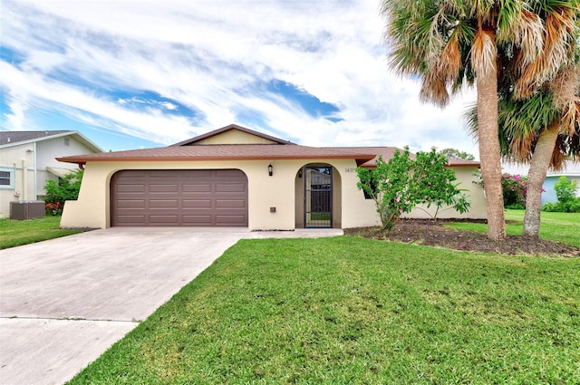 view of front of property with a garage, a front yard, and central air condition unit