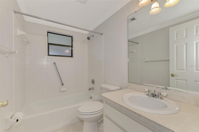 full bathroom with crown molding, tiled shower / bath combo, vanity, tile patterned floors, and toilet