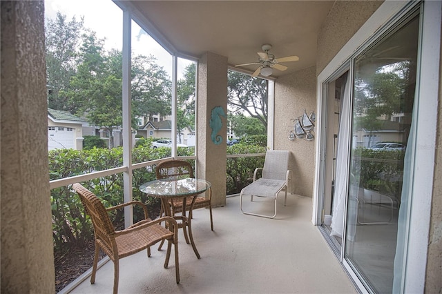 sunroom / solarium with ceiling fan