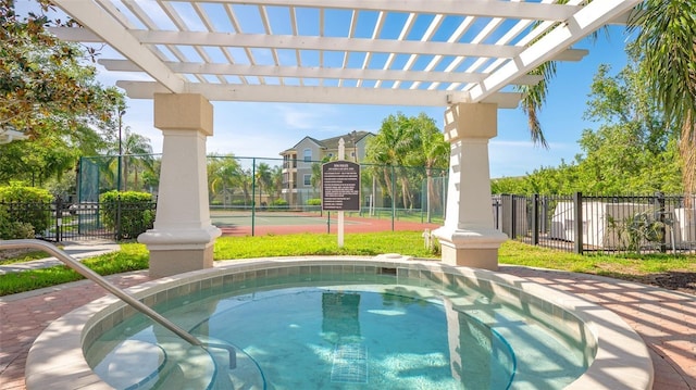 view of swimming pool featuring a pergola