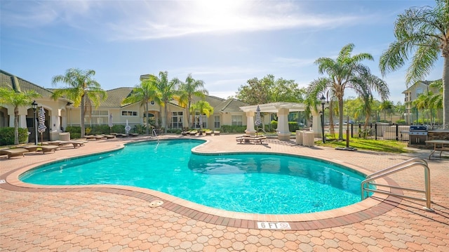 view of swimming pool featuring a patio