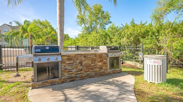 view of patio featuring grilling area and an outdoor kitchen