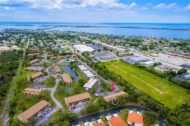 drone / aerial view with a water view