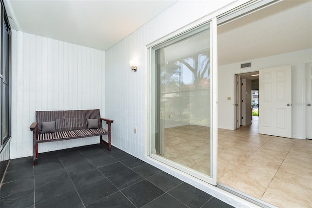 interior space featuring tile patterned flooring