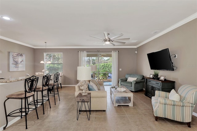 tiled living room featuring ceiling fan and crown molding