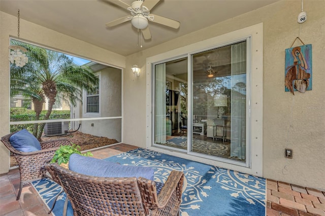 view of patio featuring central AC and ceiling fan