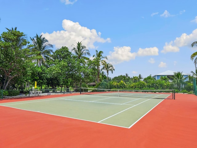 view of sport court featuring community basketball court and fence