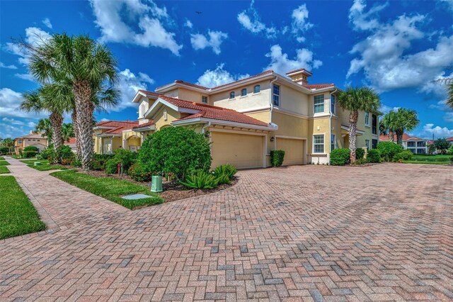 view of front of property with a garage