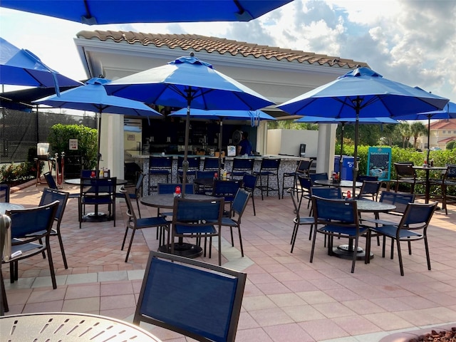 view of patio featuring a bar