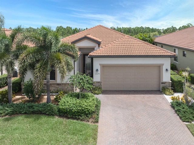 10079 Crooked Creek Dr, Venice, FL 34293 - mediterranean / spanish house with a garage