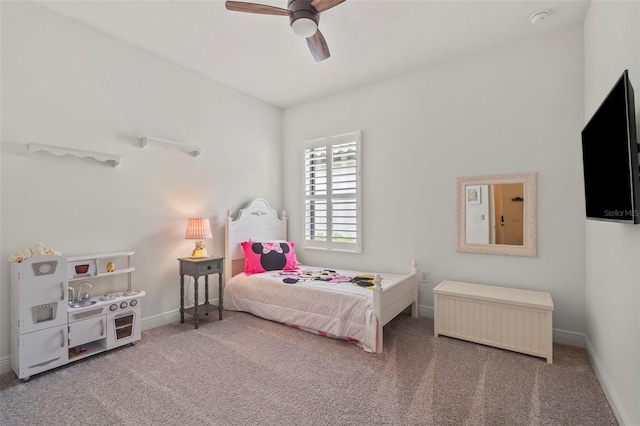 bedroom with ceiling fan and carpet floors