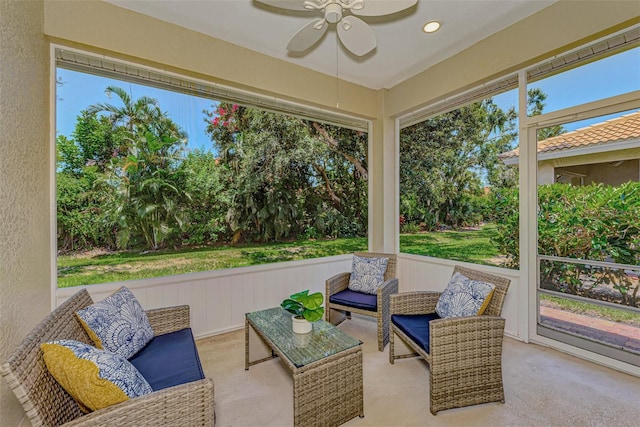 sunroom / solarium with ceiling fan