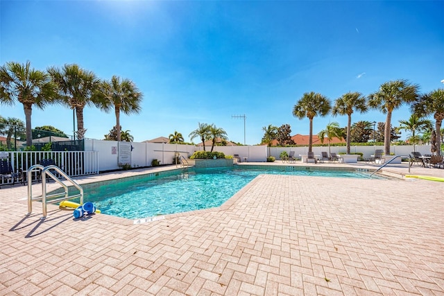 view of pool featuring a patio