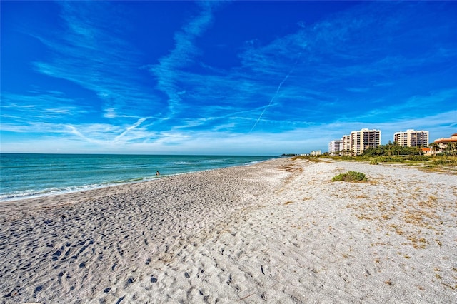 property view of water featuring a beach view