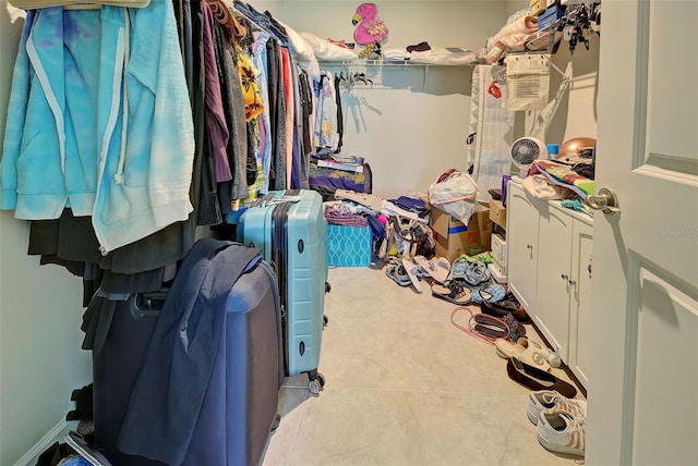 spacious closet with tile patterned flooring