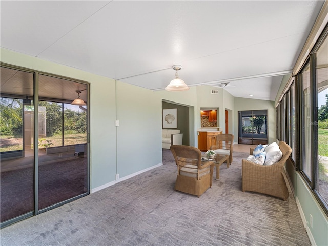 sunroom with lofted ceiling