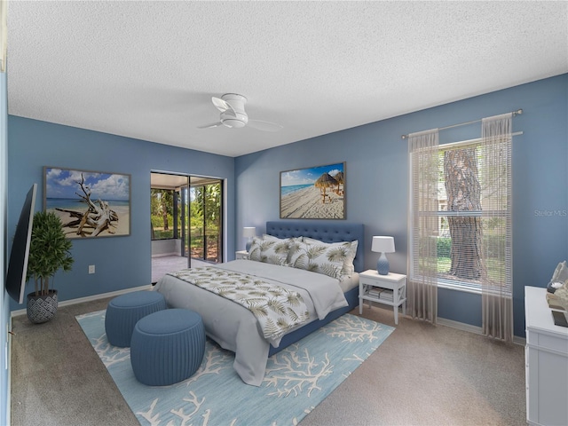 bedroom with access to exterior, a textured ceiling, ceiling fan, and carpet floors