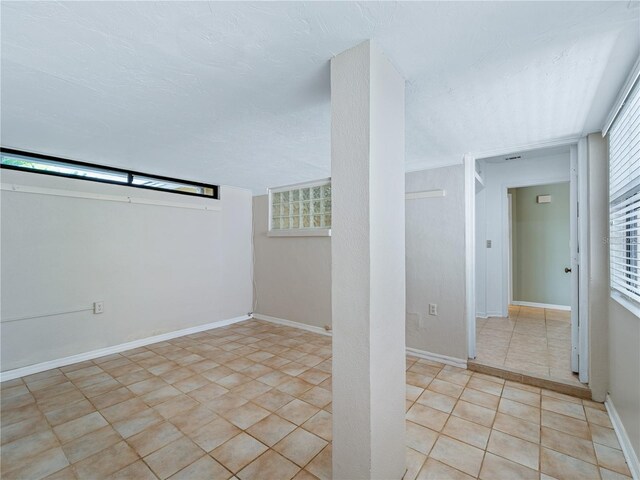 interior space with light tile patterned floors