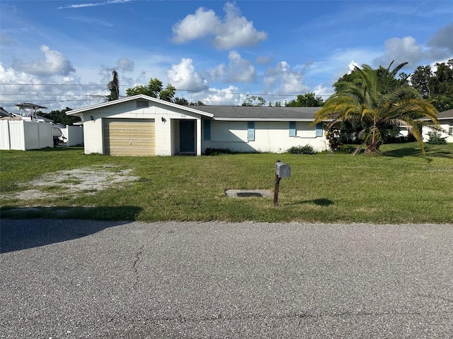 single story home featuring a front yard