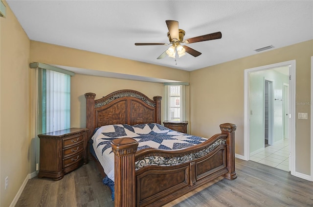 bedroom featuring ceiling fan and hardwood / wood-style floors