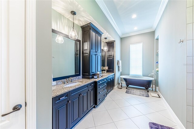 bathroom with a bath, ornamental molding, double vanity, and tile patterned floors