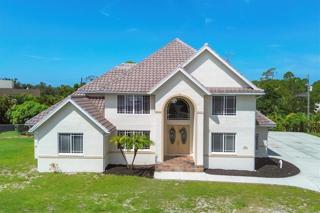 view of front of property with a front lawn