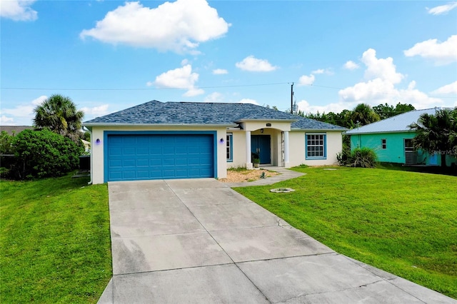 ranch-style house featuring a front lawn and a garage