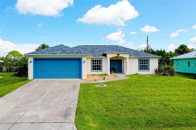 ranch-style home featuring a garage and a front yard