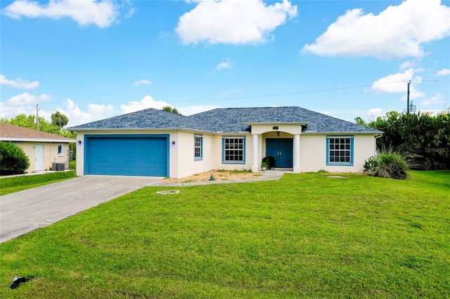 view of front of home with a garage and a front yard