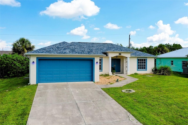 ranch-style home with a garage and a front lawn