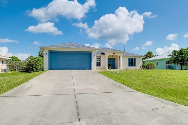 view of front facade with a garage and a front yard