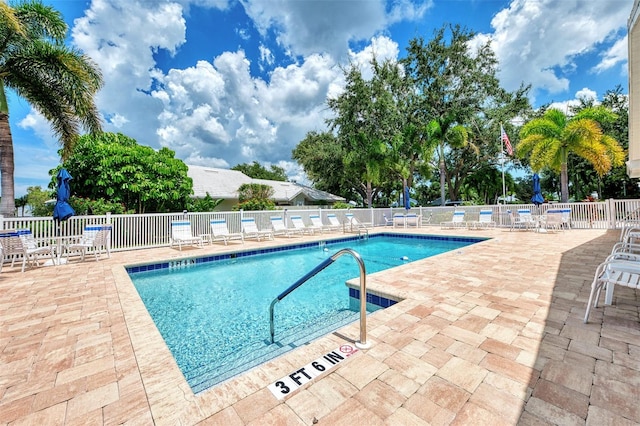 view of pool featuring a patio area