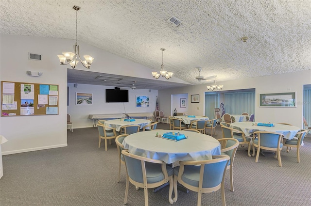 carpeted dining room featuring a chandelier, a textured ceiling, and lofted ceiling