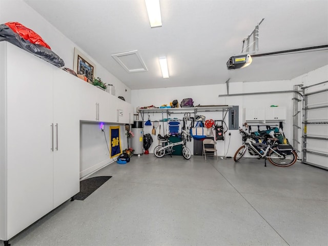 garage with a garage door opener, water heater, and electric panel