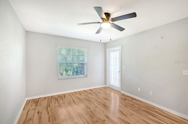 unfurnished room with ceiling fan and light hardwood / wood-style floors