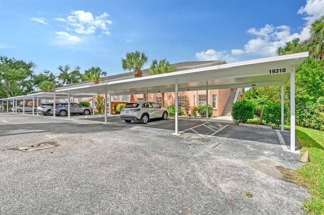 view of car parking with a carport