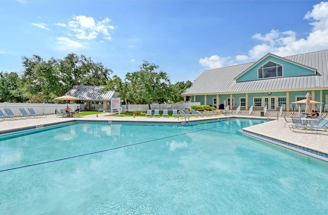 view of pool featuring a patio