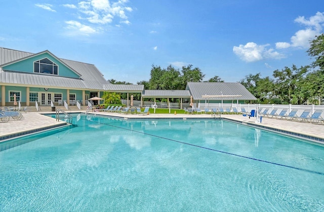 view of pool featuring a patio