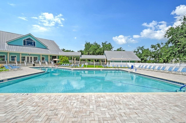 view of pool featuring a patio