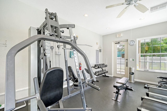 exercise area with a textured ceiling and ceiling fan