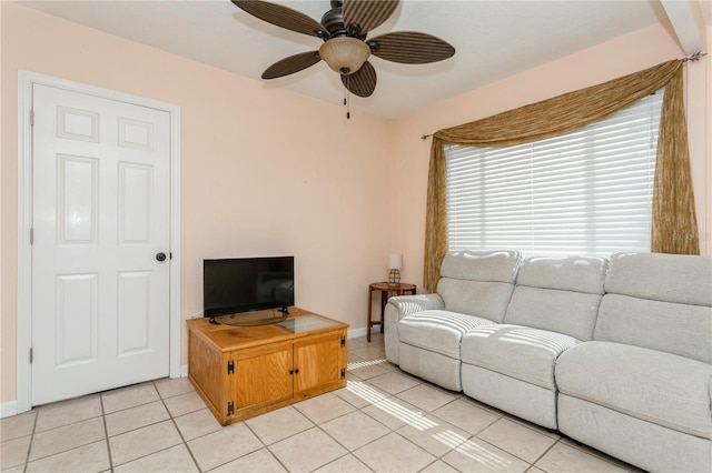 living room featuring ceiling fan and light tile patterned floors