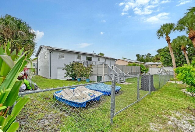 view of yard featuring a pool side deck