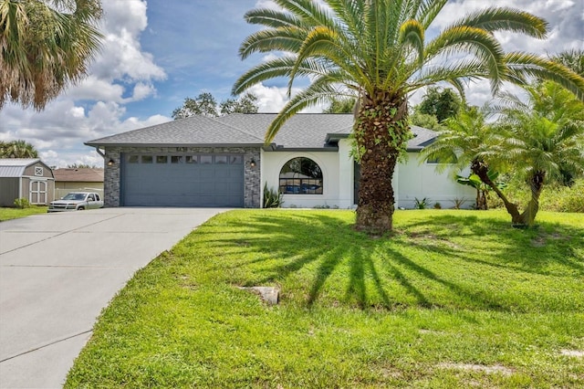 view of front facade featuring a front lawn and a garage