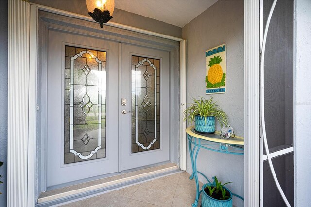 property entrance featuring french doors