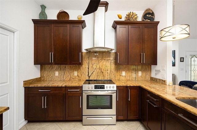 kitchen with backsplash, kitchen peninsula, stainless steel range with electric stovetop, wall chimney range hood, and light tile patterned flooring