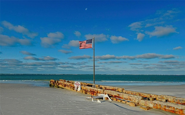 property view of water featuring a beach view